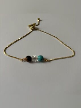 Adjustable gold plated bracelet with tiger eye - Gemini zodiac sign